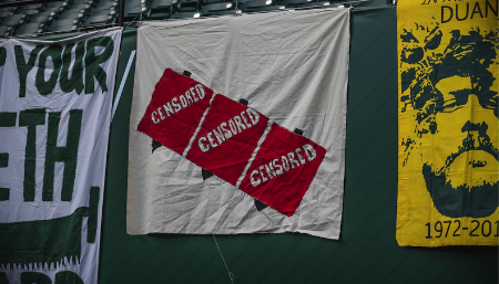 Banner depicting a censored three arrows.